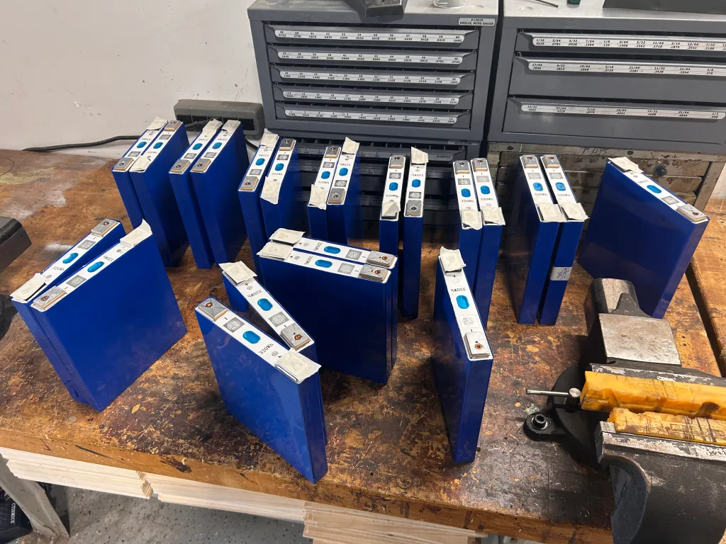 A table full of lithium cells Image